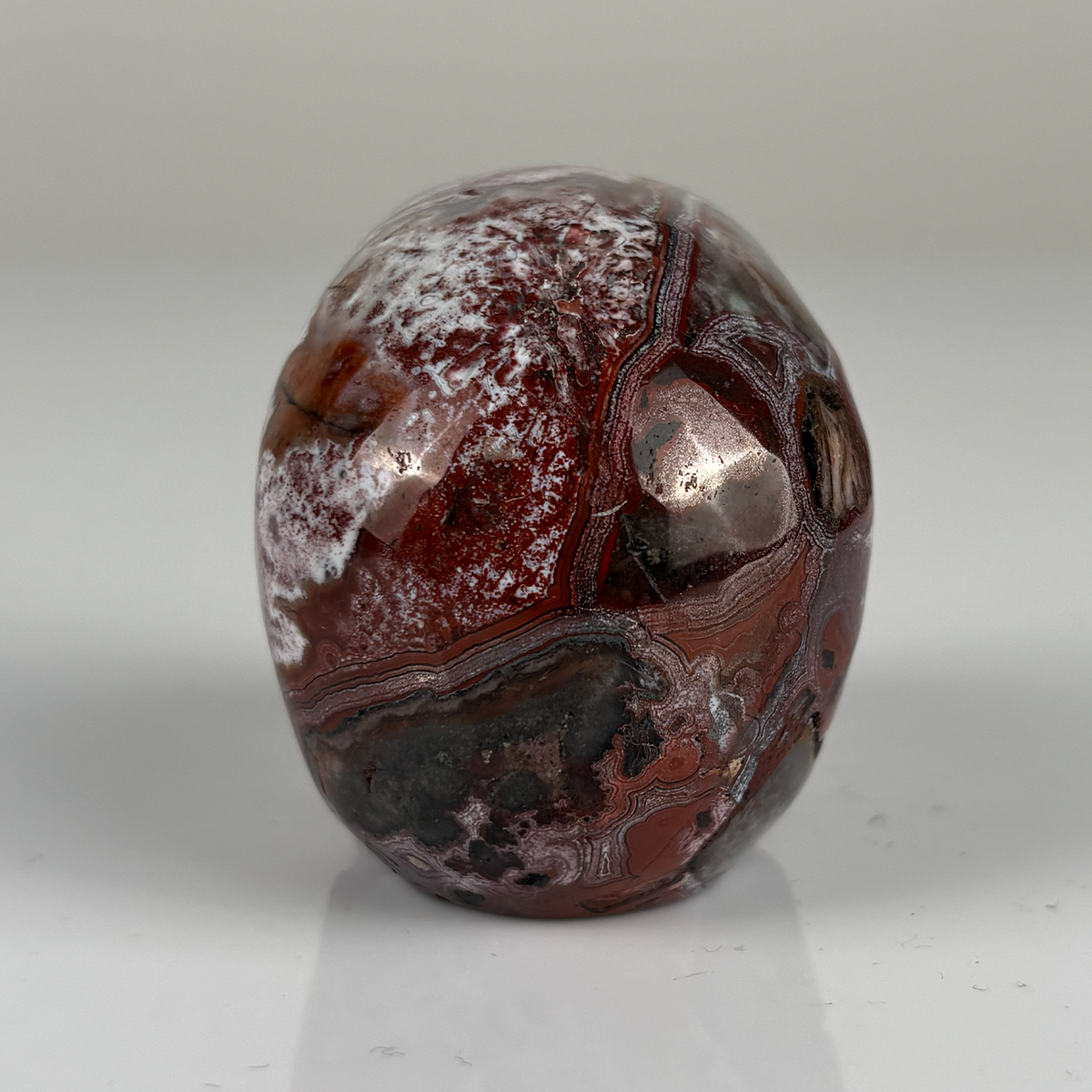 2" Red Crazy Lace Agate Crystal Skull – Pattern D