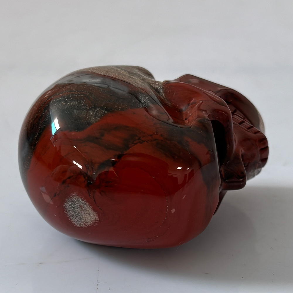 2 Zoll großer Totenkopf aus rotem Jaspiskristall