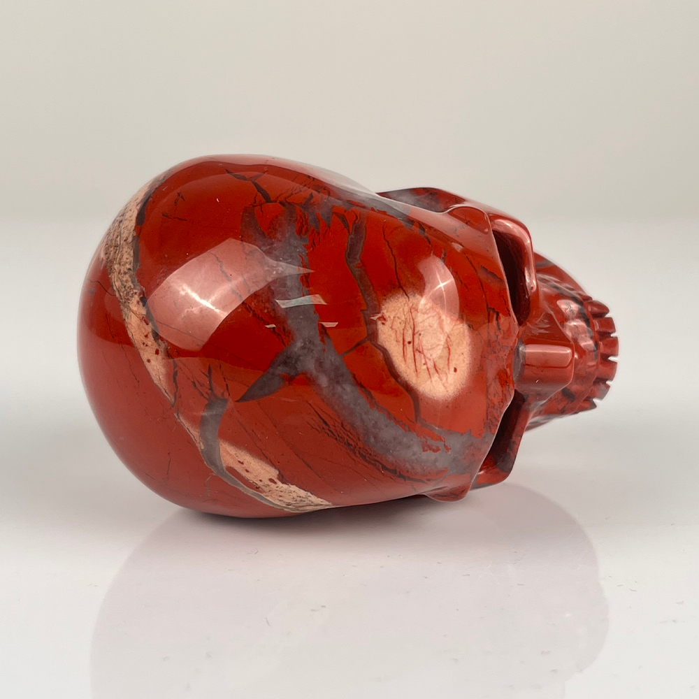 Crâne en cristal de jaspe rouge de 7,6 cm
