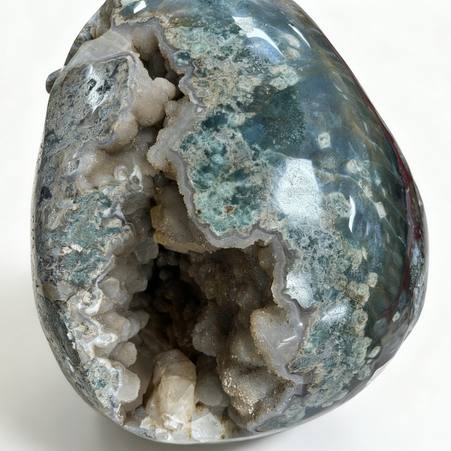 Moss Agate Geode Crystal Skull