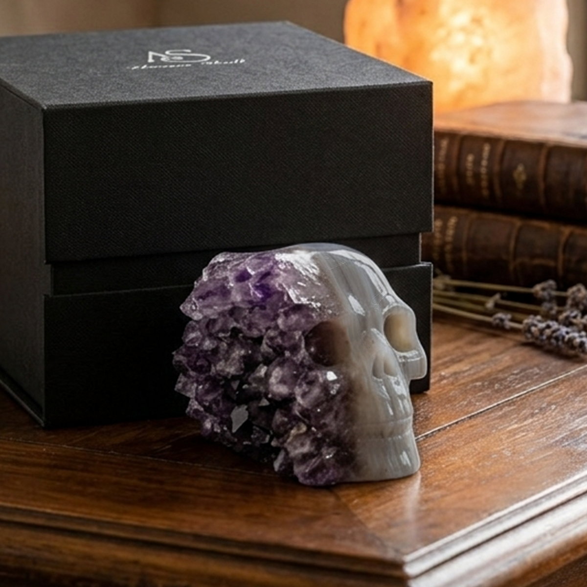 Additional view of a 2-inch Amethyst cluster half-face skull carving