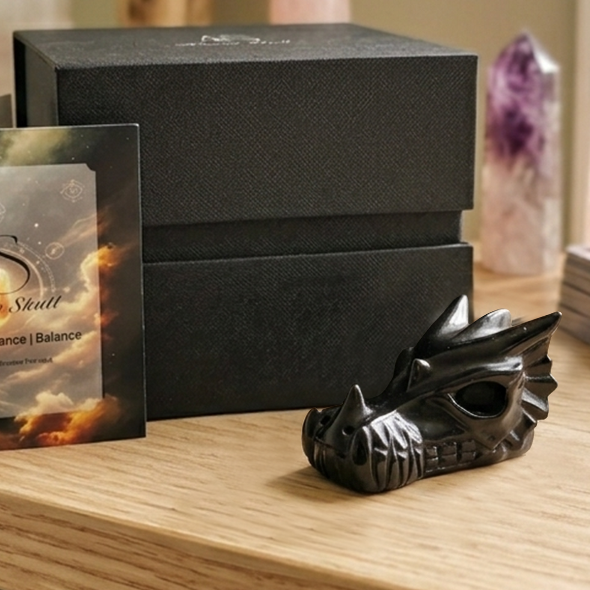 Additional view of a 2-inch Black Obsidian dragon skull carving