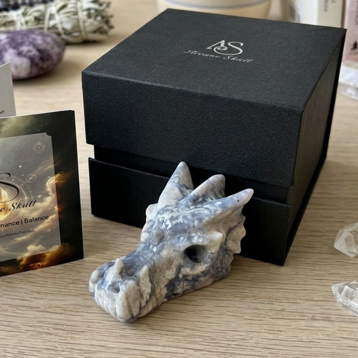 Additional view of a 2.5-inch Blue Flower Agate dragon skull carving