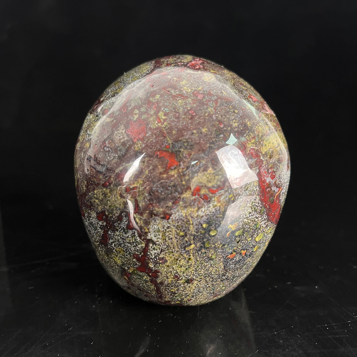 Back view of a 4.5-inch Dragon Bloodstone human skull carving