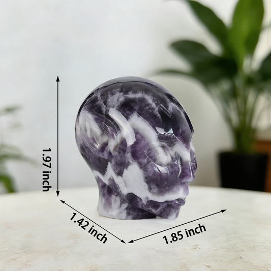 Additional view of a 2-inch Dream Amethyst alien skull carving