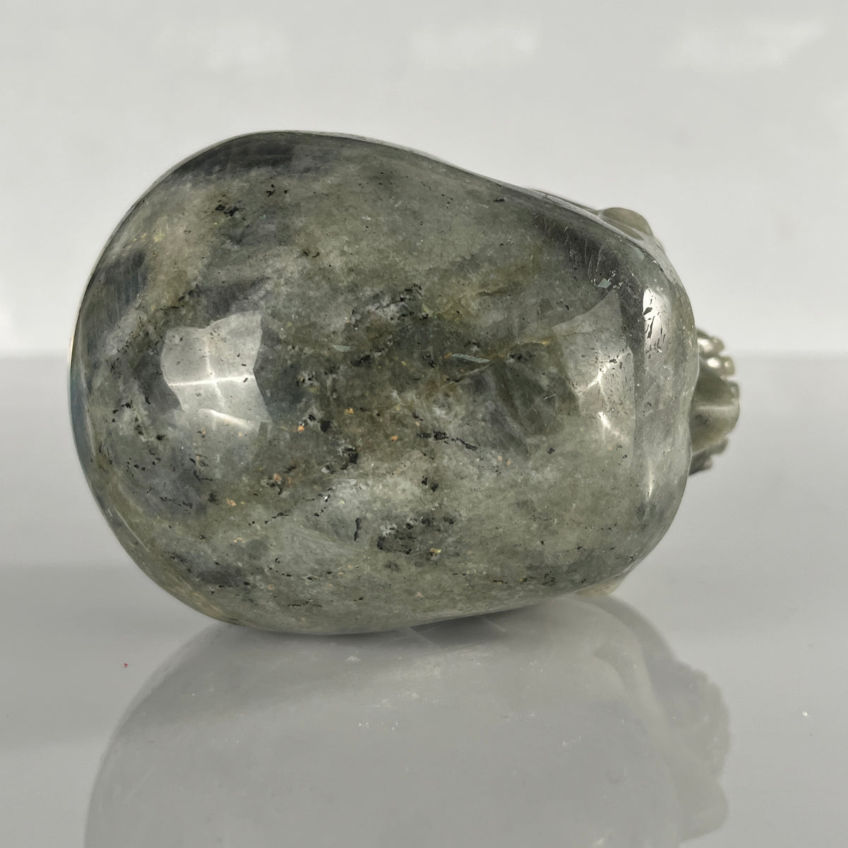 Top view of a 4.5-inch Grey Labradorite human skull carving