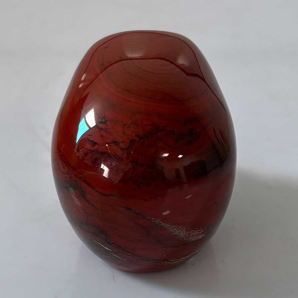 Crâne en cristal de jaspe rouge de 5 cm