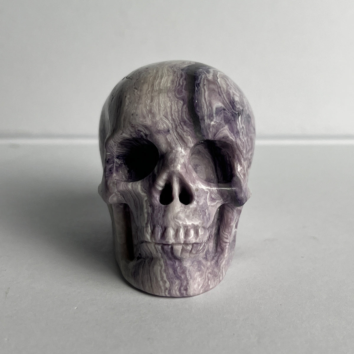 2" Purple Peacock Stone Crystal Skull - Pattern E