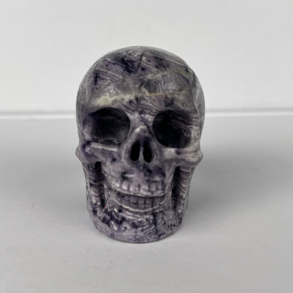 2" Purple Peacock Stone Crystal Skull - Pattern C