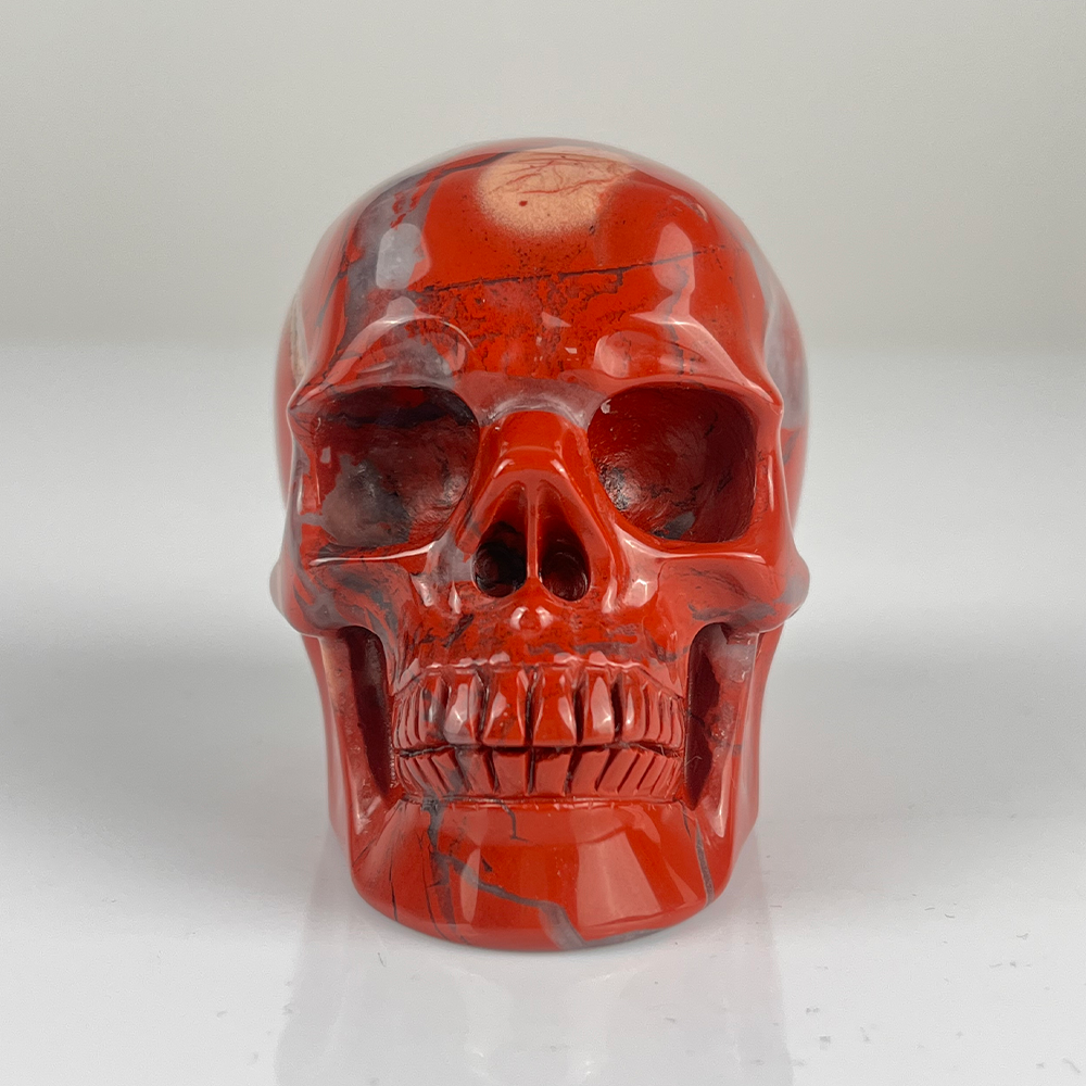 Crâne en cristal de jaspe rouge de 7,6 cm