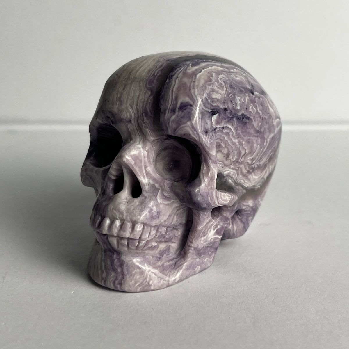 2" Purple Peacock Stone Crystal Skull - Pattern E