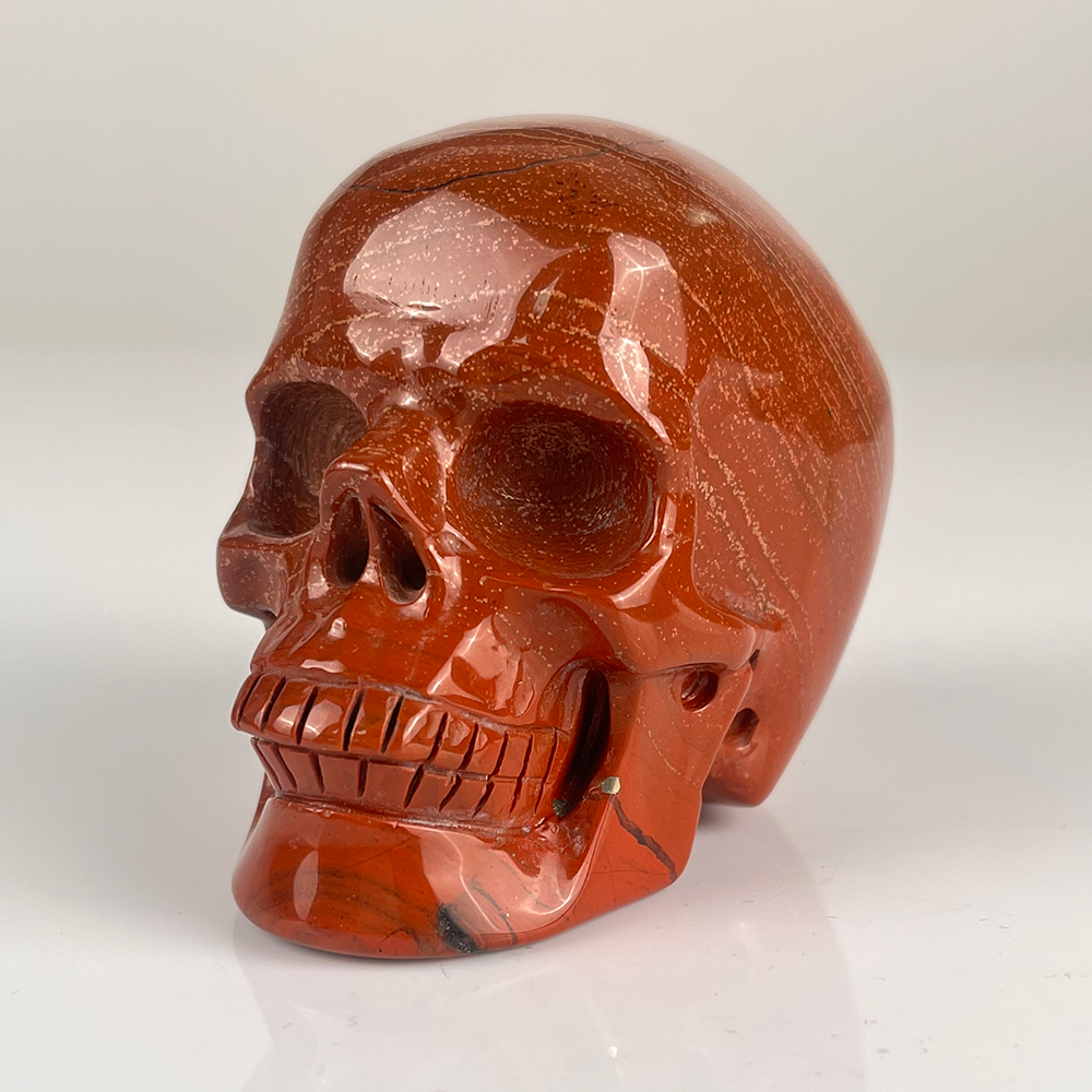 Crâne en cristal de jaspe rouge de 7,6 cm
