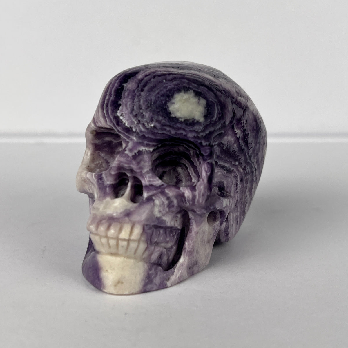 2" Purple Peacock Stone Crystal Skull - Pattern A