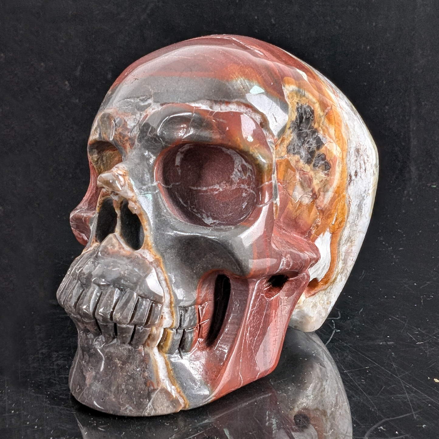 3 Zoll großer, handgeschnitzter Totenkopf aus rotem Crazy Lace Achat-Kristall – Naturstein