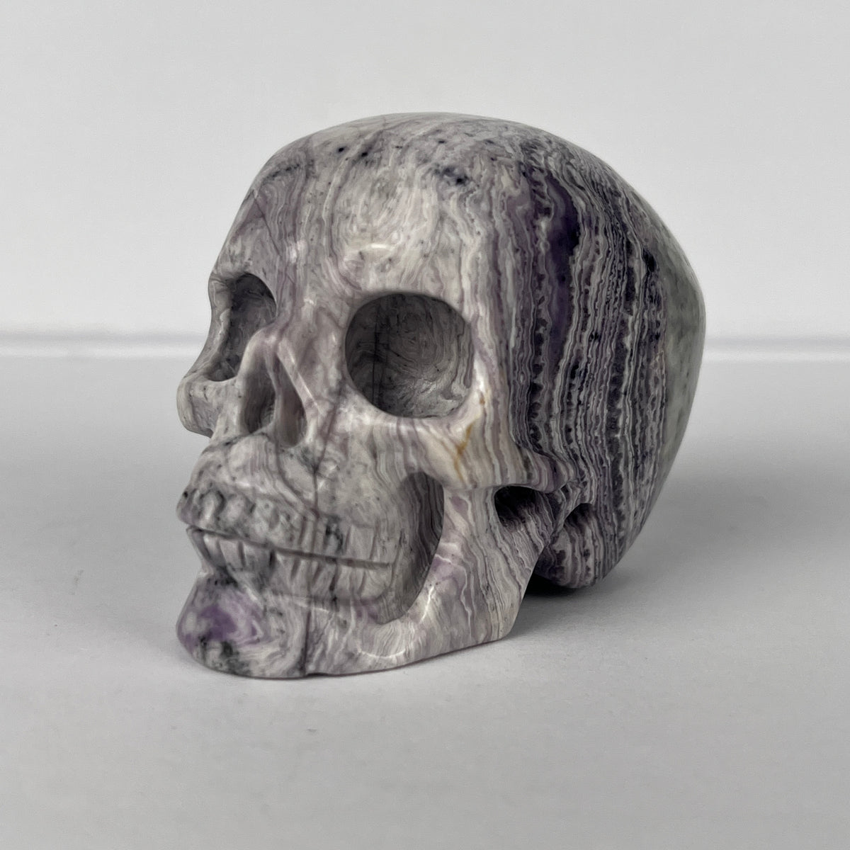 2" Purple Peacock Stone Crystal Skull - Pattern D