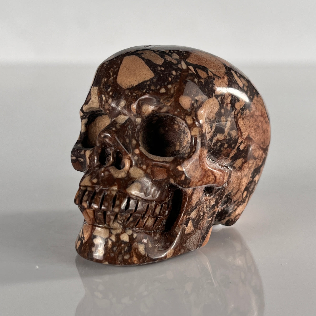 2" Brecciated Red Jasper Crystal Skull - Pattern A