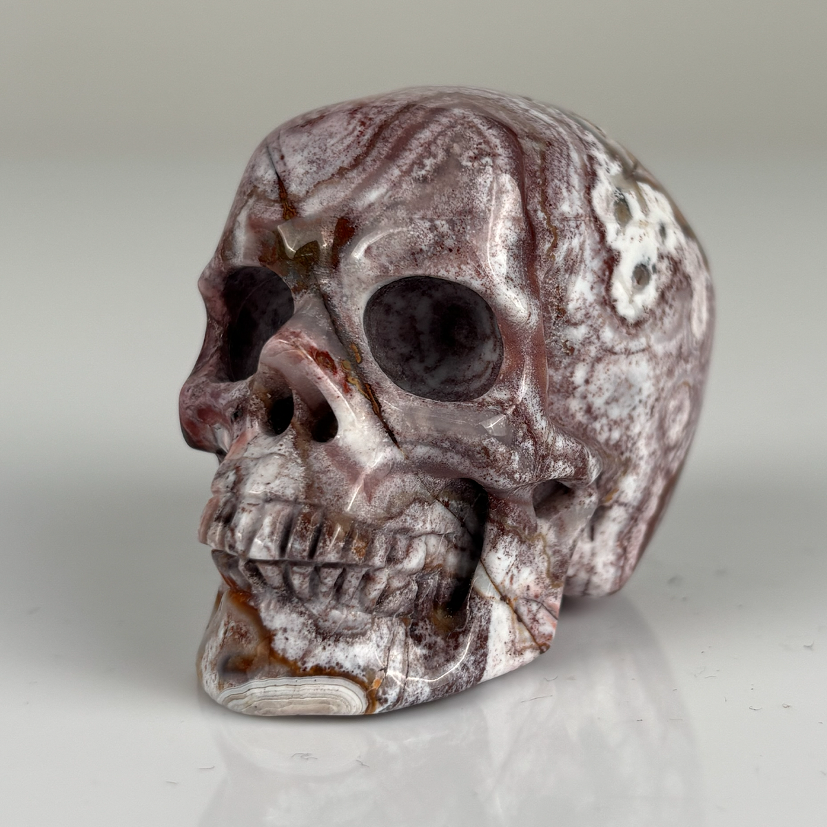 2" Red Crazy Lace Agate Crystal Skull – Pattern D