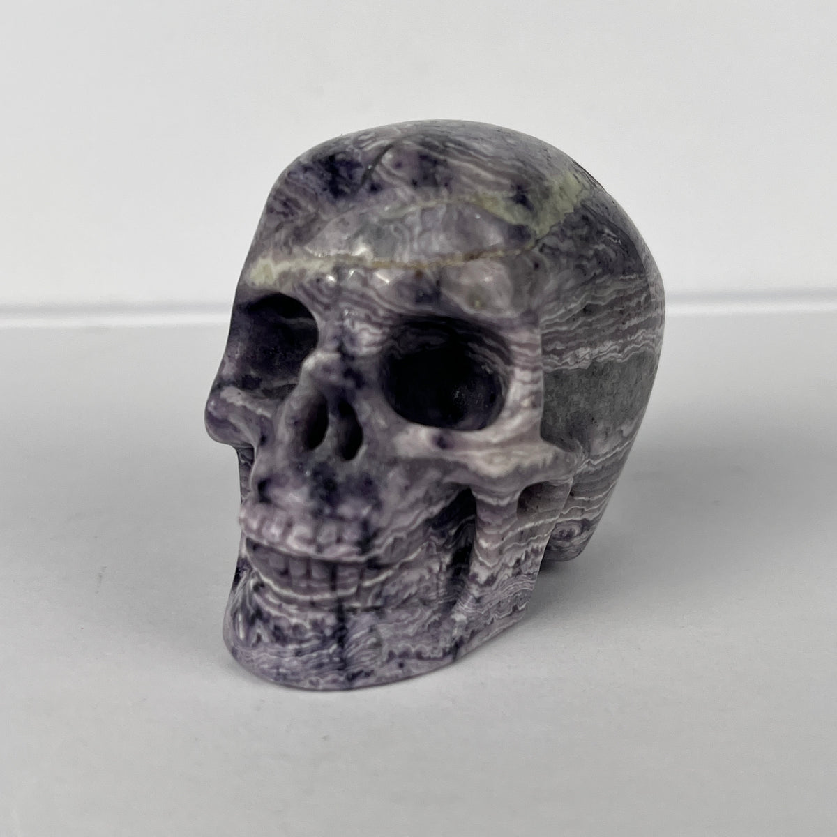 2" Purple Peacock Stone Crystal Skull - Pattern C
