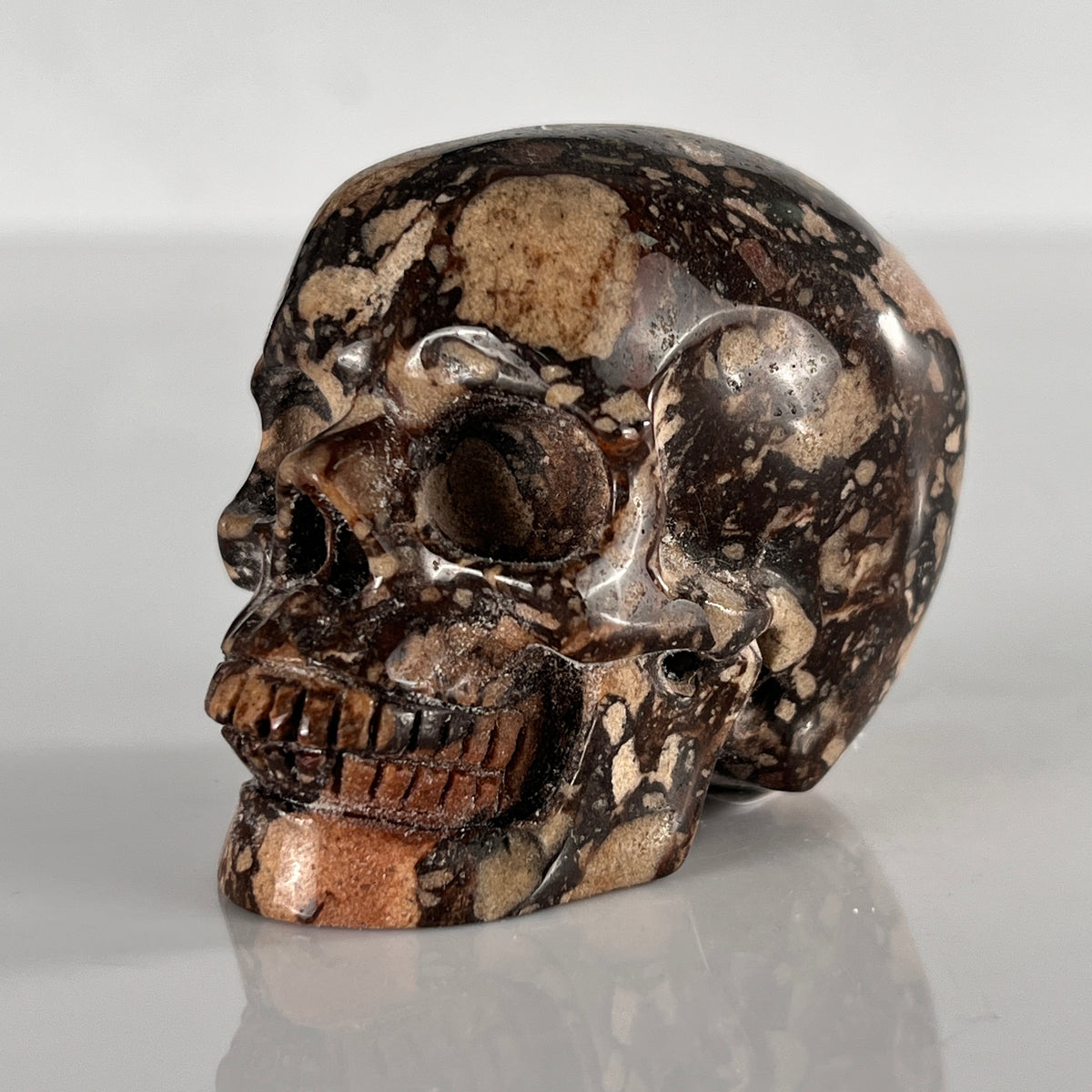 2" Brecciated Red Jasper Crystal Skull - Pattern B