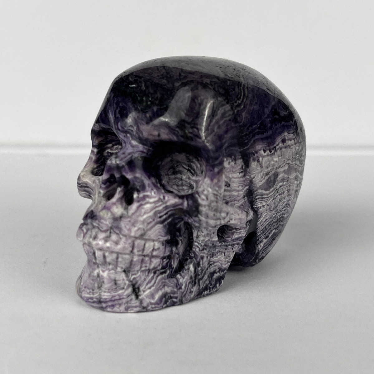 2" Purple Peacock Stone Crystal Skull - Pattern F