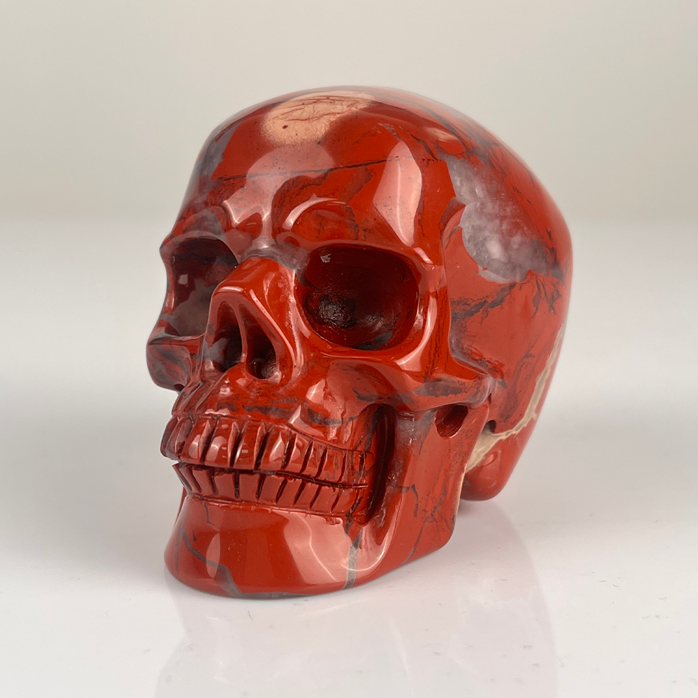 Crâne en cristal de jaspe rouge de 7,6 cm