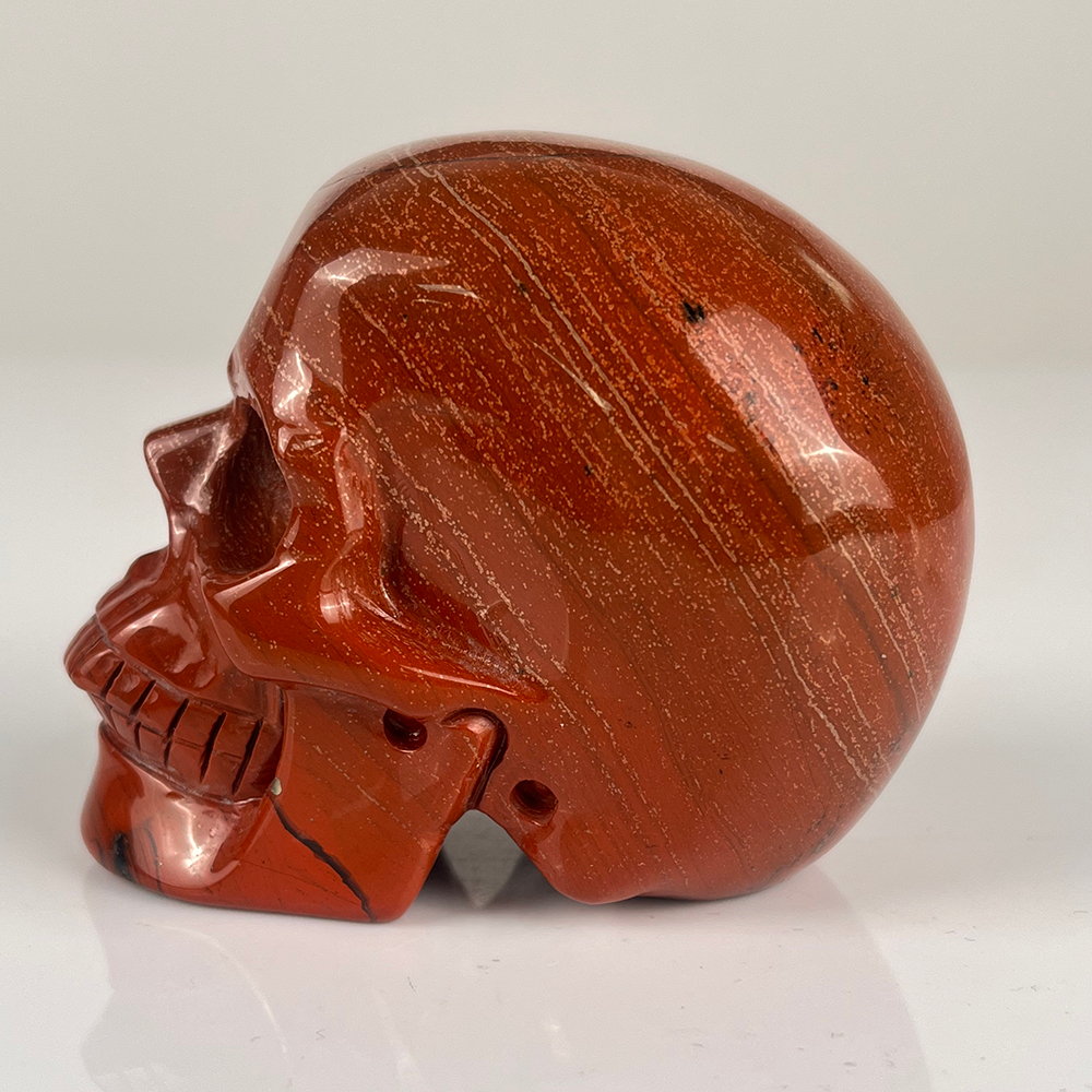 Crâne en cristal de jaspe rouge de 7,6 cm