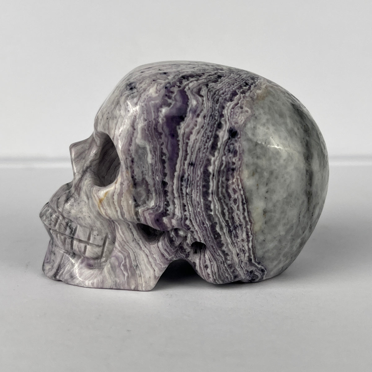 2" Purple Peacock Stone Crystal Skull - Pattern D