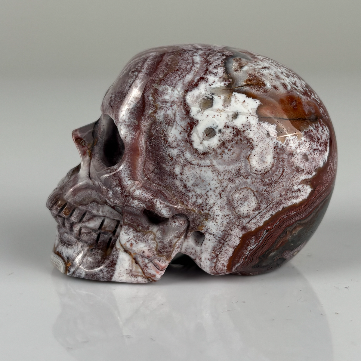 2" Red Crazy Lace Agate Crystal Skull – Pattern D