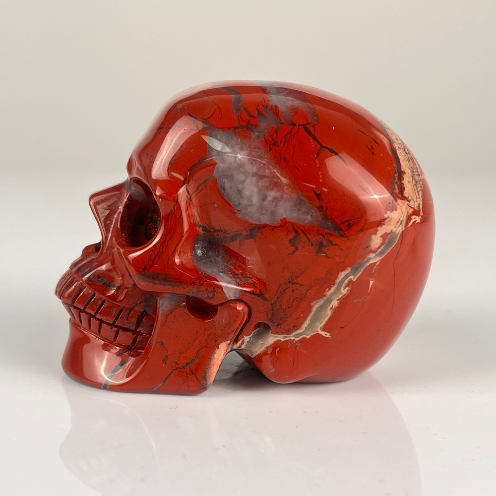 Crâne en cristal de jaspe rouge de 7,6 cm