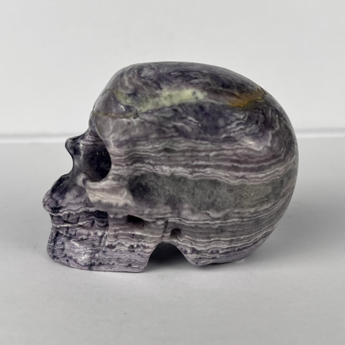 2" Purple Peacock Stone Crystal Skull - Pattern C