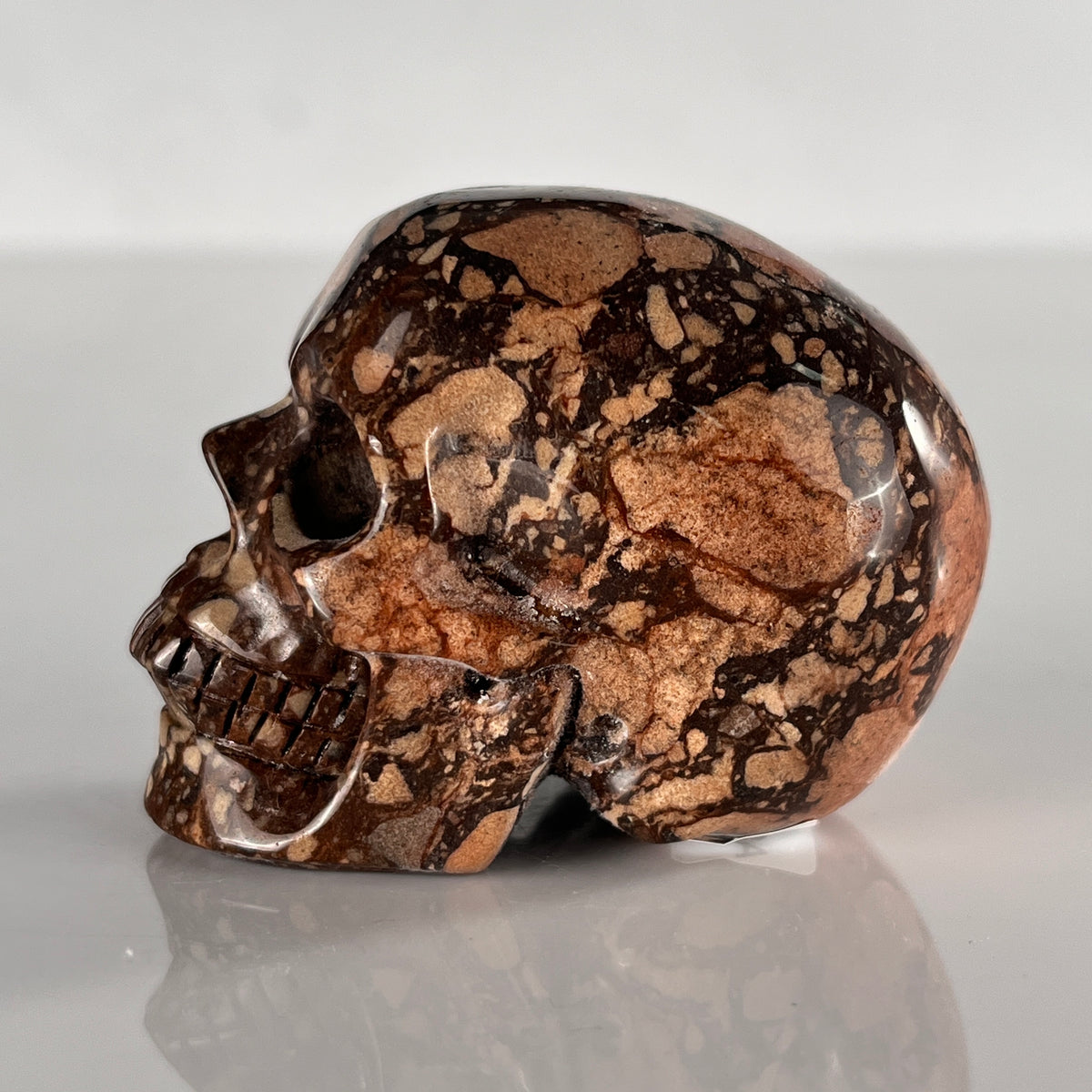 2" Brecciated Red Jasper Crystal Skull - Pattern A