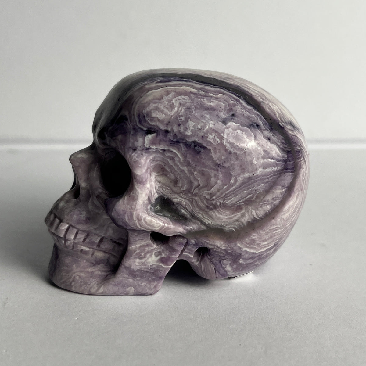 2" Purple Peacock Stone Crystal Skull - Pattern E