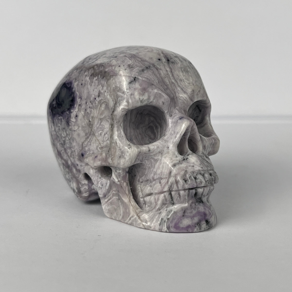 2" Purple Peacock Stone Crystal Skull - Pattern D