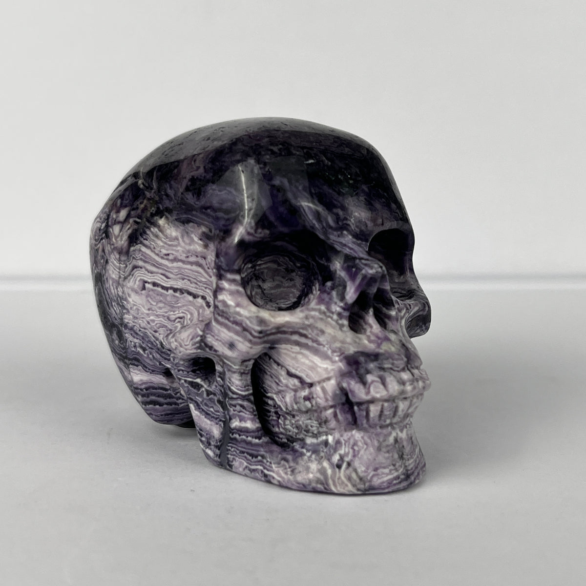 2" Purple Peacock Stone Crystal Skull - Pattern F