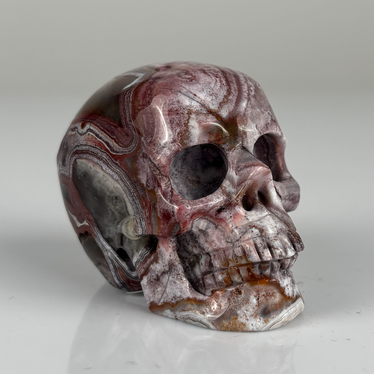 2" Red Crazy Lace Agate Crystal Skull – Pattern D