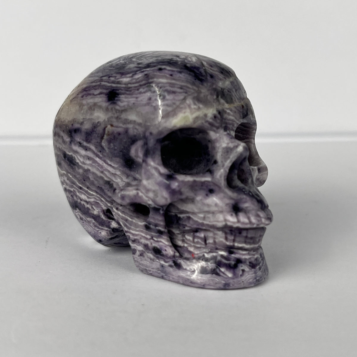 2" Purple Peacock Stone Crystal Skull - Pattern C