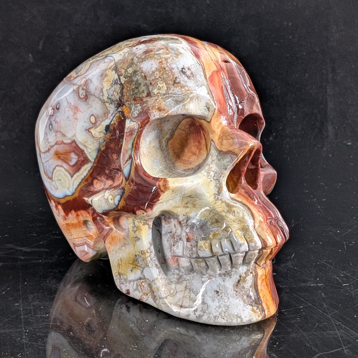 3 Zoll großer, handgeschnitzter Totenkopf aus rotem Crazy Lace Achat-Kristall – Naturstein