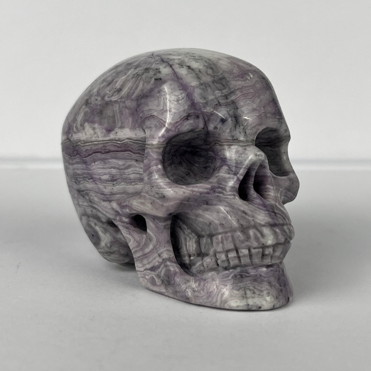 2" Purple Peacock Stone Crystal Skull - Pattern B