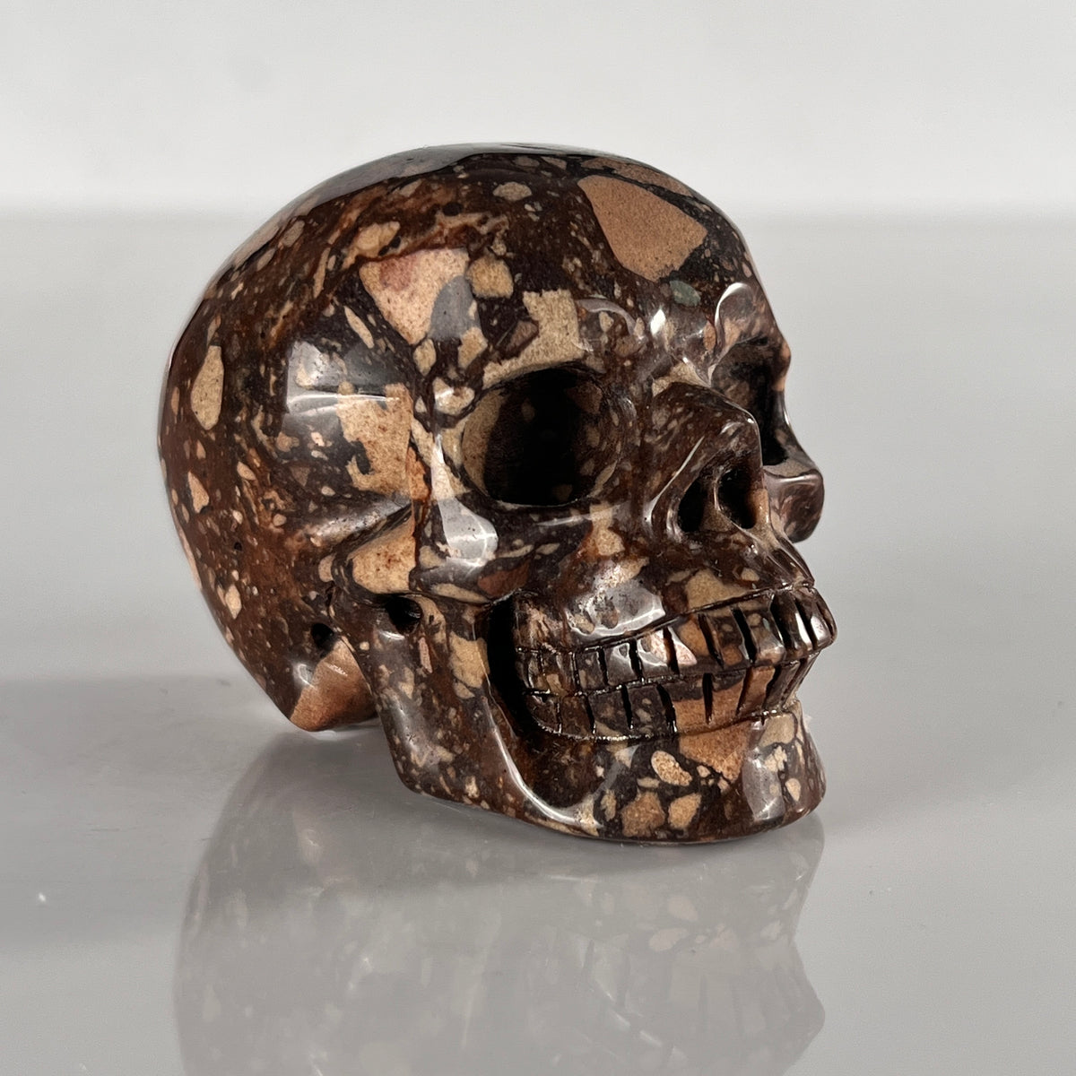 2" Brecciated Red Jasper Crystal Skull - Pattern A