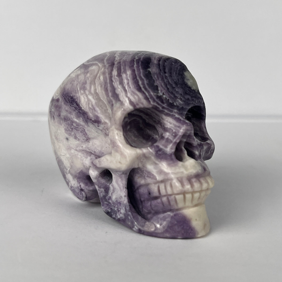 2" Purple Peacock Stone Crystal Skull - Pattern A