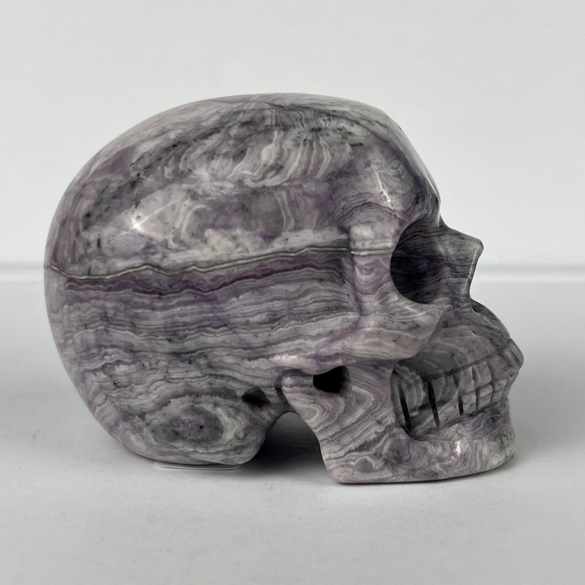 2" Purple Peacock Stone Crystal Skull - Pattern B