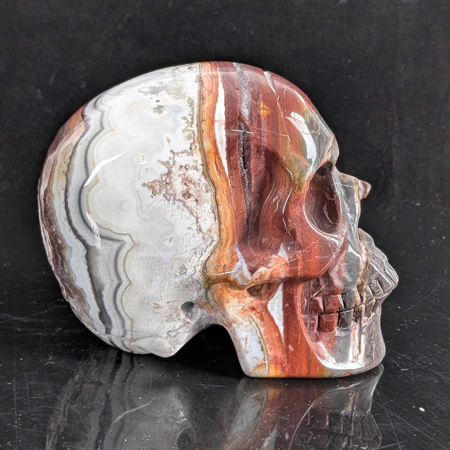 3 Zoll großer, handgeschnitzter Totenkopf aus rotem Crazy Lace Achat-Kristall – Naturstein
