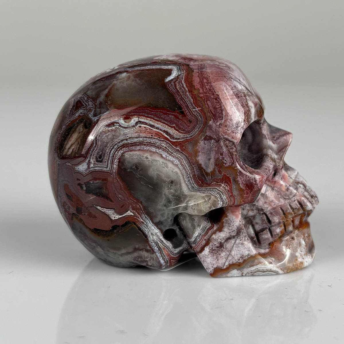 2" Red Crazy Lace Agate Crystal Skull – Pattern D