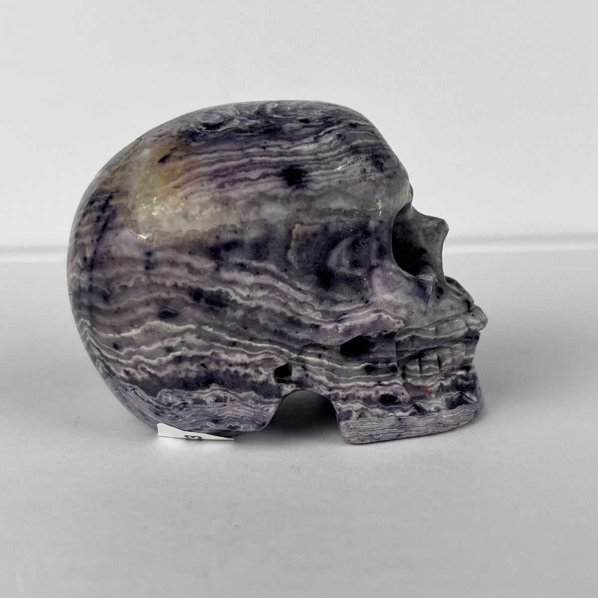 2" Purple Peacock Stone Crystal Skull - Pattern C
