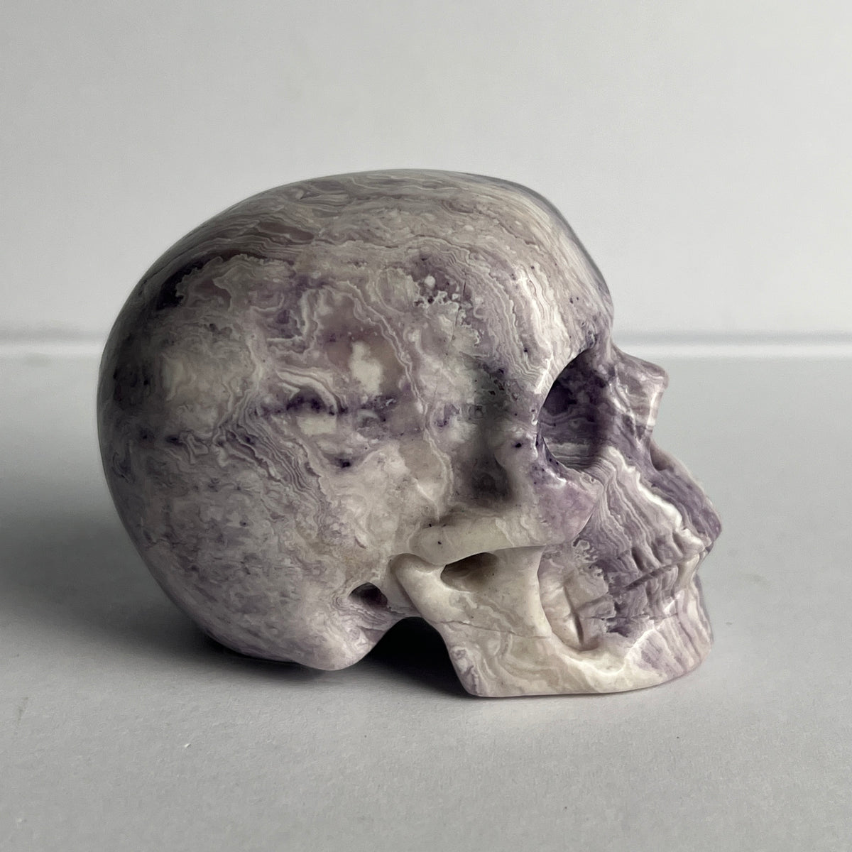 2" Purple Peacock Stone Crystal Skull - Pattern E