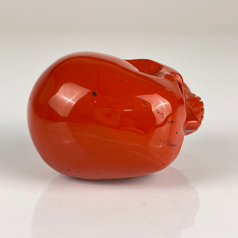 Crâne en cristal de jaspe rouge de 5 cm