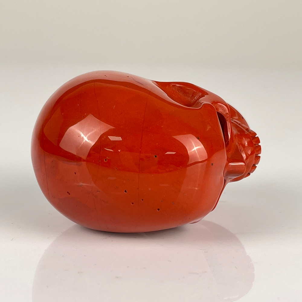 Crâne en cristal de jaspe rouge de 5 cm