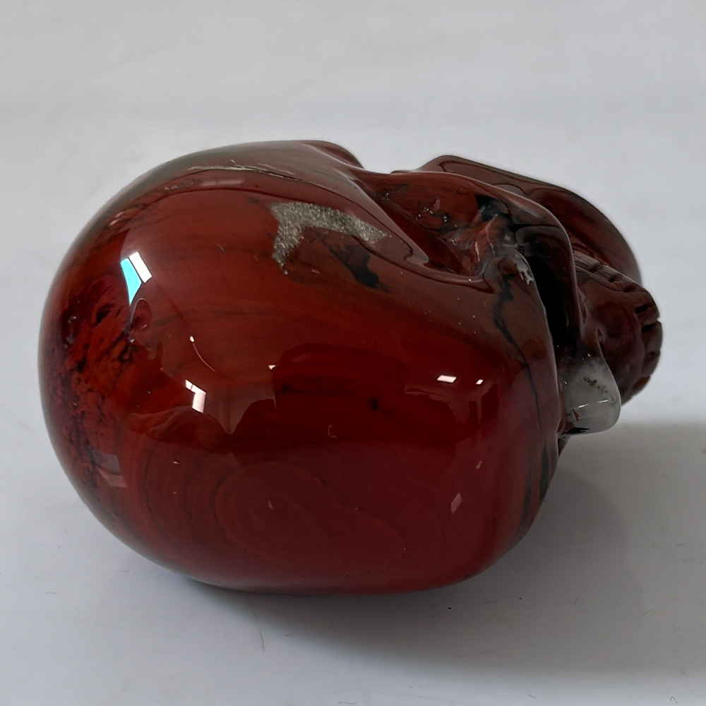 Crâne en cristal de jaspe rouge de 5 cm