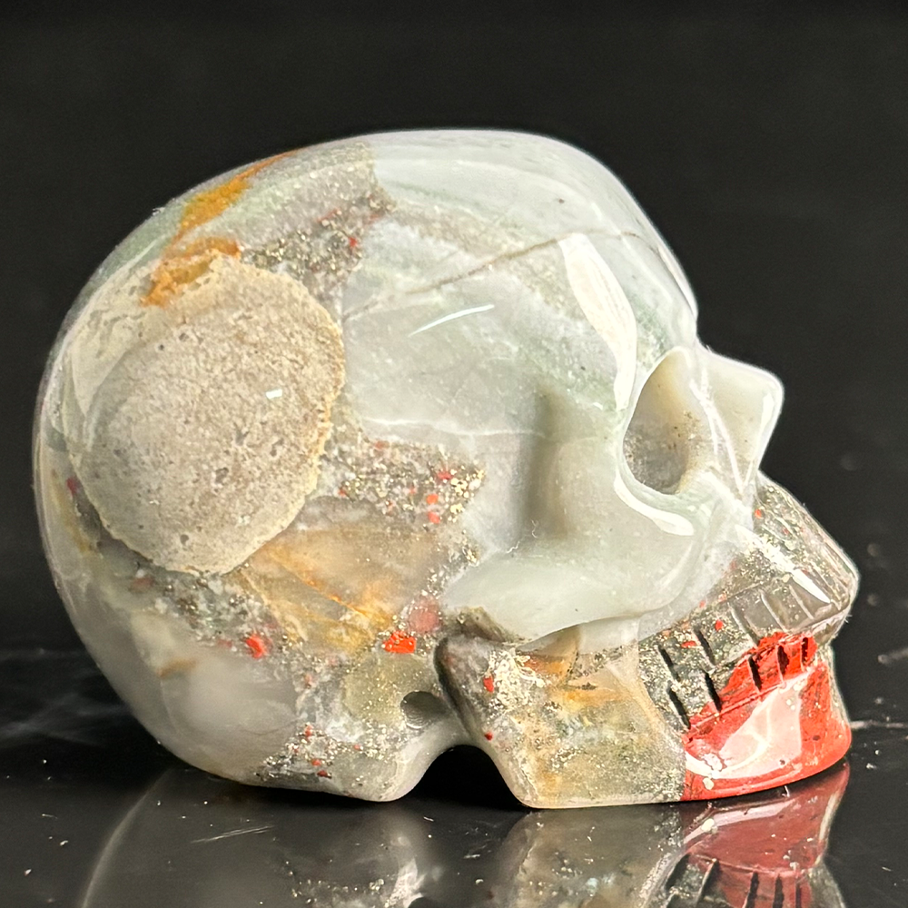 Right view of a 2-inch African Bloodstone human skull carving