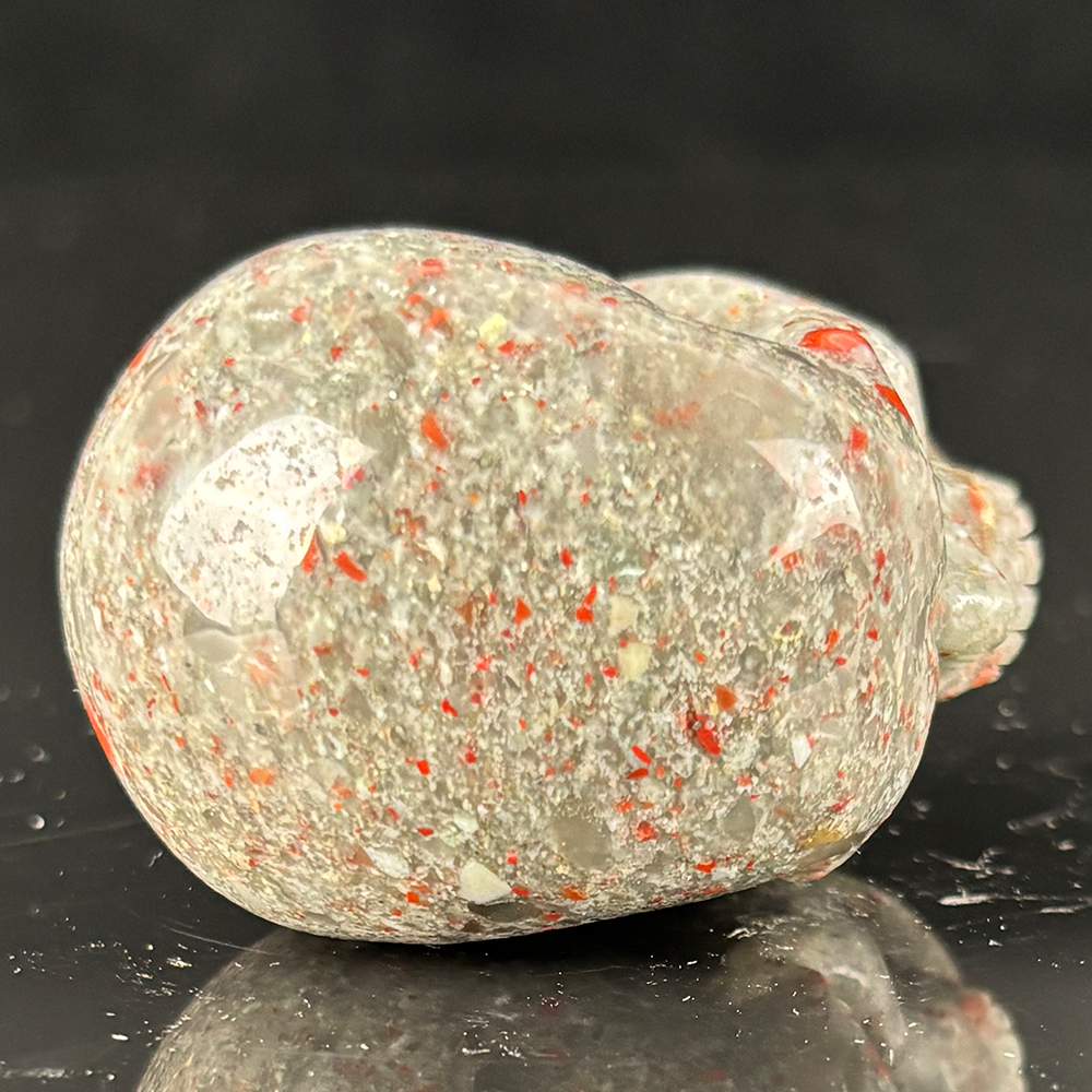 Top view of a 2-inch African Bloodstone human skull carving